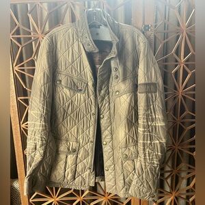 Barbour quilted jacket. Size medium. unique with Steve McQueen photo lining